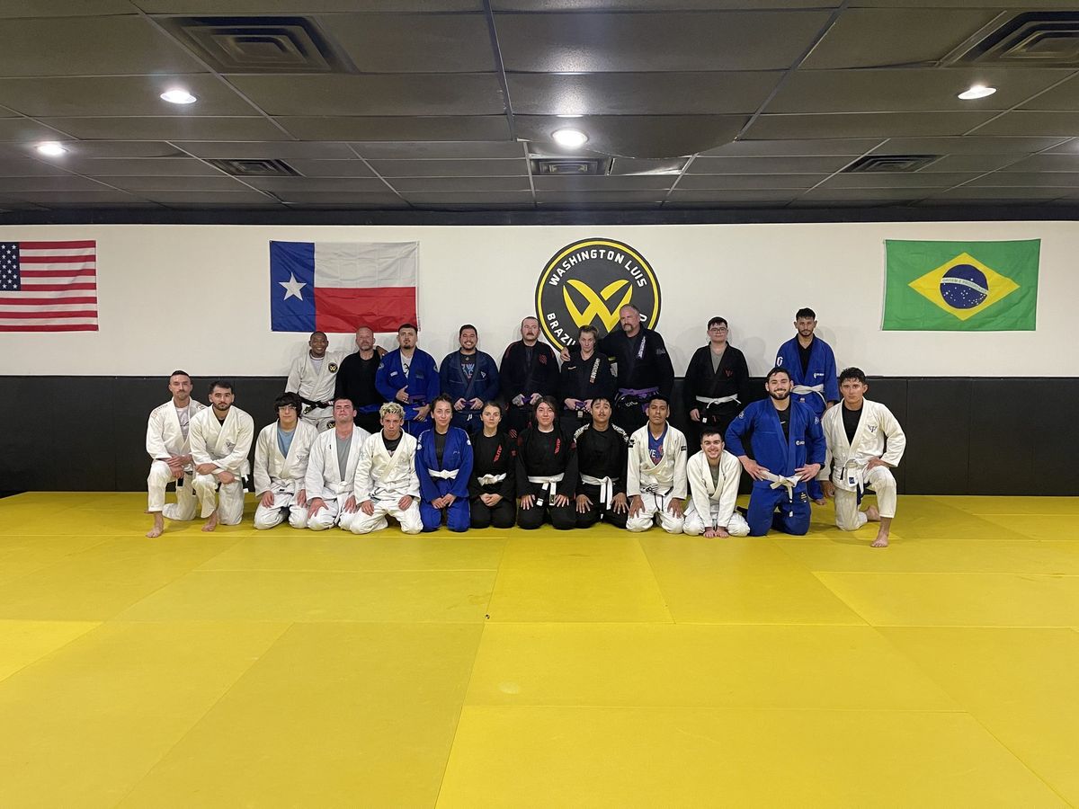 Adult students and coaches at Washington Luis Brazilian Jiu-Jitsu
