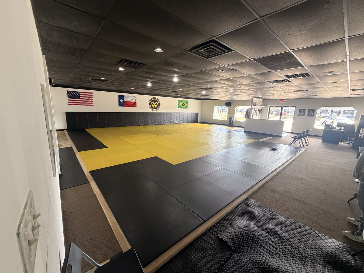 Inside the Washington Luis Brazilian Jiu-Jitsu training space in Deer Park, TX